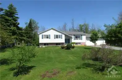 You're greeted by impeccably maintained landscaping, leading to a clean & inviting exterior.